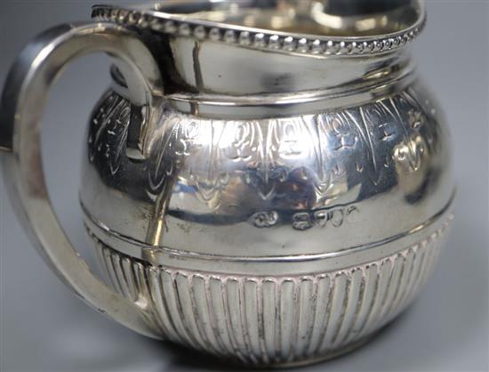 A Victorian silver teapot and matching sugar bowl, London, Charles Boyton II, 1878, gross 16oz.
